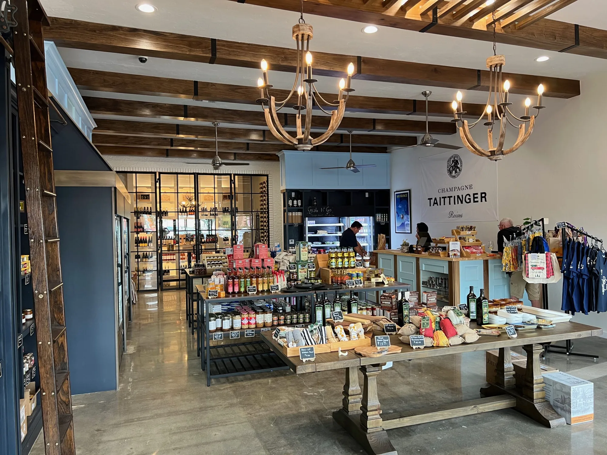 Storefront of the St. Germain Gourmet Market with shelves of French goods