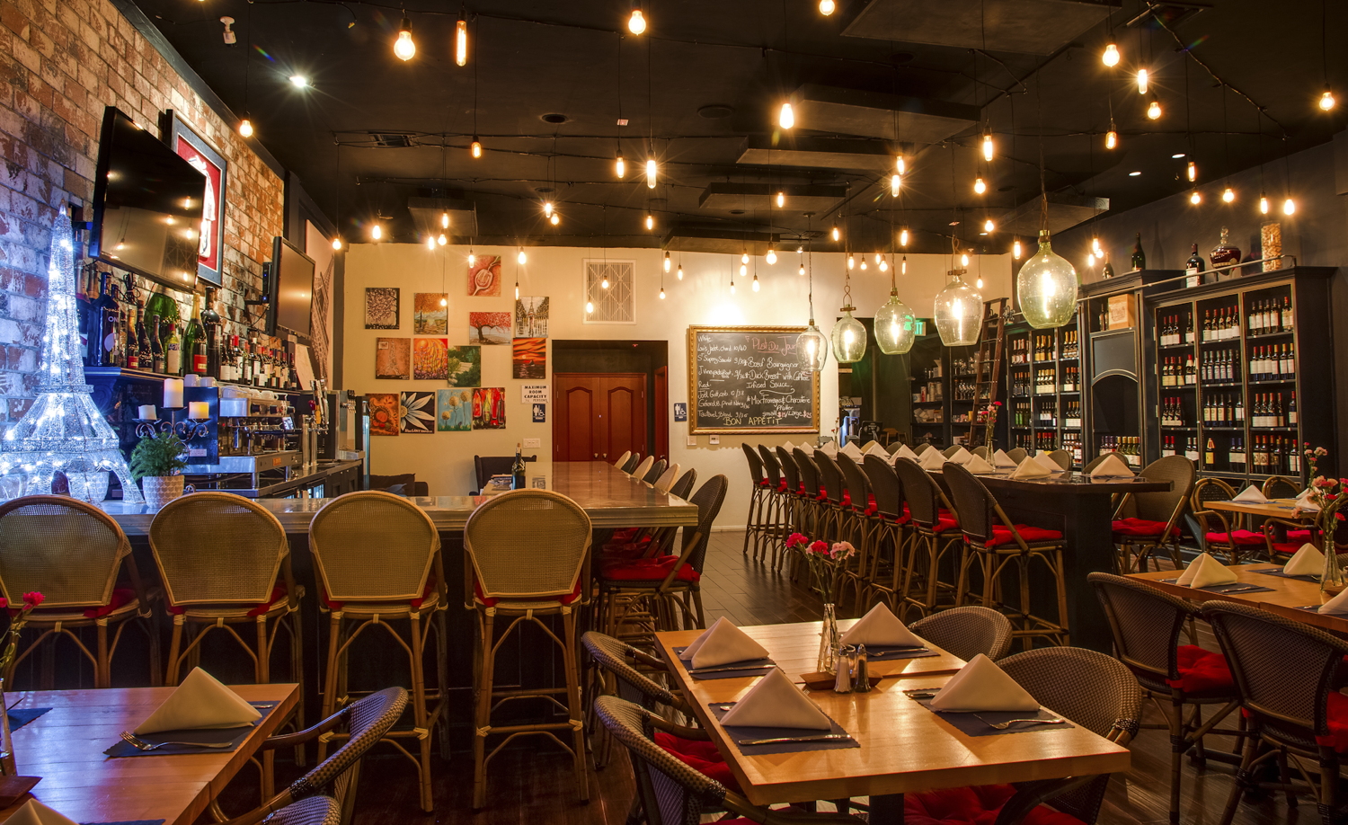 Wine wall and long table at bar